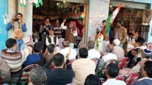 Ex-MLA Ashok Sharma addressing public meeting at Dhangri in Kalakote on Monday. 