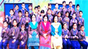 Medal winning karatekas posing along with the School staff at Heaven Kingdom High School, Janipur in Jammu.
