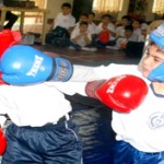 Young kids fighting for the top honours during Kickboxing Championship at BSF School Paloura in Jammu. 