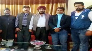 Mufti Samoon Kazmi with BJP activists at Jammu on Monday.