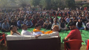 Pawan Gupta addressing a public rally at Tikri on Tuesday.