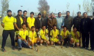 Winning team of Mehjoor Memorial Cup posing with dignitaries at Pulwama.