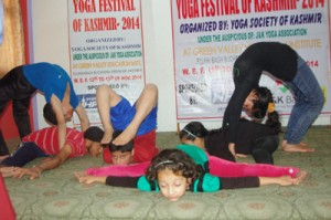 Asans being performed during Yoga Programme in Srinagar.   