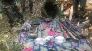 Arms and ammunition recovered from a hideout in Bhaderwah, by security forces.