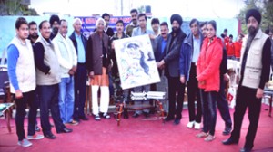 New Delhi based renowned artist, V S Rahi showing his painting during the camp.