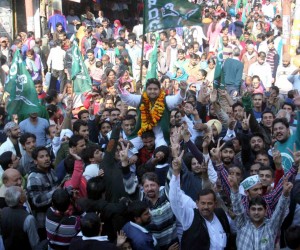 PDP candidate from Jammu East, Bharat Chowdhary having raised on shoulders by supporters at Panjirthi in Jammu.
