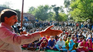 Pawan Gupta addressing a massive rally at Jib on Monday.