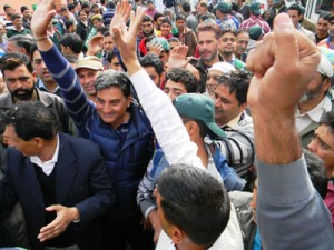 PDP candidate from Bhaderwah constituency, Sheikh Mehboob Iqbal surrounded by supporters during a public meeting in Bhaderwah.