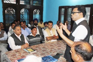 BSP general secretary Narender Kashyap addressing party leaders in a meeting at Jammu on Tuesday. 