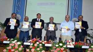 JU VC Prof R D Sharma and others releasing souvenir of three-day conference during inaugural function on Saturday.
