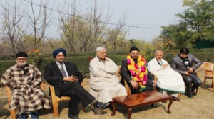 PDP patron Mufti Mohammad Sayeed welcoming new entrants into the party fold at Srinagar on Friday.