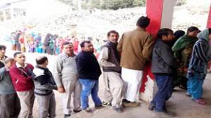 Voters in queue outside a polling station in Kishtwar on Tuesday.