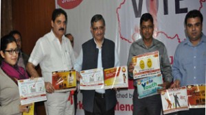 CEO, Umang Narula and other dignitaries releasing awareness posters and pamphlets at Jammu on Friday.