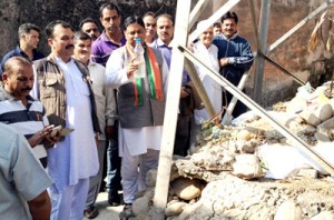 Sat Sharma taking stock of people’s problems in Ward 35 of Jammu on Tuesday.