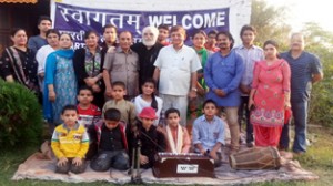 Participants of musical play ‘Hum Sab Ek Hai’ posing for group photograph.