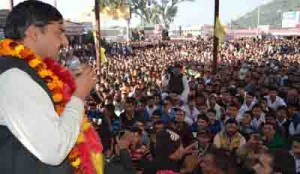 Saraf Singh Naag addressing a massive rally at Katra on Wednesday.
