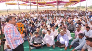 MLA, Ashwani Sharma addressing a party meeting at Bishnah on Sunday. 