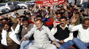 Casual labours and need base workers staging protest dharna in Jammu on Monday.  -Excelsior/Rakesh