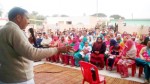 Minister for PHE, Sham Lal Sharma addressing public meeting at Akhnoor on Saturday.