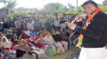 Pawan Khajuria addressing a public meeting at Mand on Saturday.