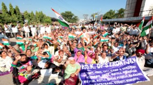 PoJK refugees staging protest demonstration in Jammu on Thursday. -Excelsior/Rakesh