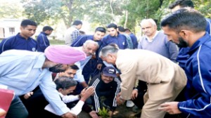 Saplings of medicinal plants being planted at Forest Guard Training School, Domana in Akhnoor.