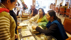 Customers purchasing jewellery on 3rd anniversary of Tanishq in Jammu on Friday.