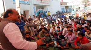 Ex-Minister Surjit Singh Slathia addressing public meeting in Bari Brahmana area of Vijaypur constituency.