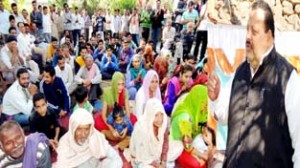 Provincial President NC Devender Singh Rana addressing public meeting in Nagrota constituency on Sunday.