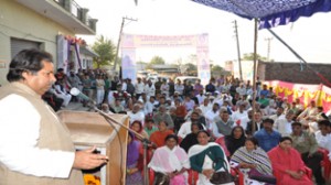 Minister for Housing, Raman Bhalla addressing public meeting at Jammu on Friday.