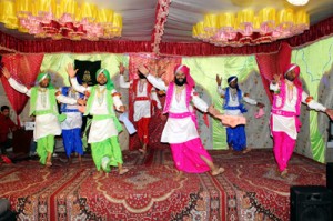 CRPF personnel performing during a cultural program at Pulwama in South Kashmir.