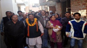 BJP Candidate Sat Sharma during campaign on Tuesday.