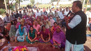 Chander Parkash Ganga addressing election meeting at Ramgarh on Wednesday. -Excelsior/Gautam