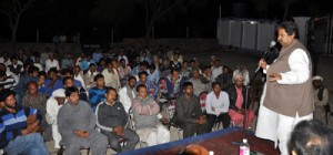 Minister for Housing Raman Bhalla addressing public meeting at Jammu on Wednesday.