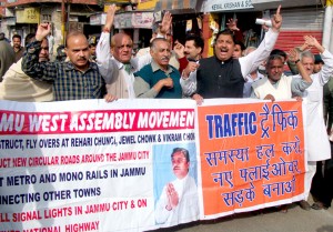 Sunil Dimple, president  Jammu West Assembly Movement and others holding protest demonstration at Jammu on Friday.