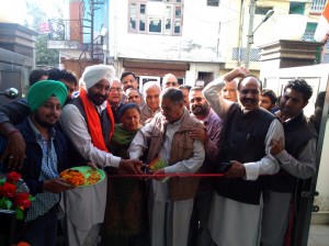 DCC Jammu (Urban) president, Anil Chopra, with S S Shingari inaugurating election office at Bakshi Nagar on Friday.