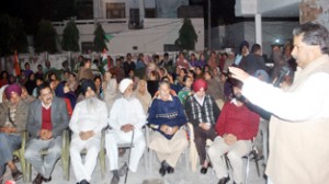Minister for Housing Raman Bhalla addressing public gathering at Jammu on Monday.
