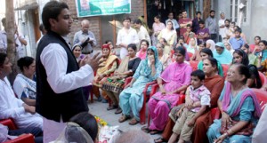 PDP candidate Bharat Chowdhary addressing a gathering at Jammu on Wednesday.