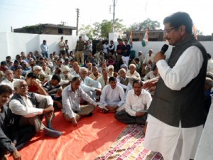 Gulchain Singh Charak addressing public meeting in Bishnah constituency.