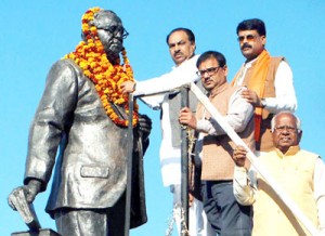 Floral tributes being paid to Bharat Ratna, Dr B R Ambedkar on his 58th death anniversary.       	         -Excelsior/Rakesh