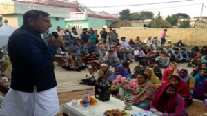 Cong candidate Sham Lal Sharma addressing public meeting at Zad in Akhnoor.