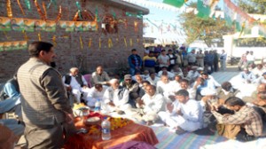 Cong candidate Gulchain Singh Charak addressing public meeting in Bishnah. 