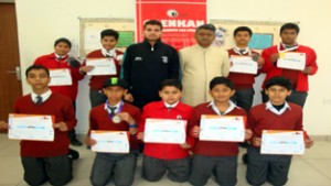 Winners of Kick Boxing Championship posing for group photograph at G D Goenka Public School in Jammu.