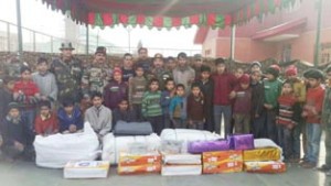 Orphans who were provided with essential items under Sadhbhavna posing for group photograph on Monday.