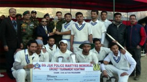 Winners of 6th Police Martyrs Memorial T-20 Cricket Tournament posing for a photograph on Friday.