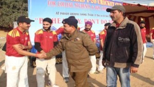 S K Chouhan, S P City Jammu interacting with players at Parade ground on Monday.