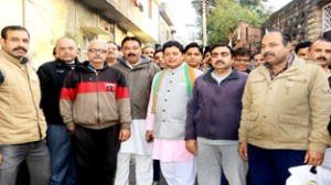 BJP candidate for Jammu East constituency, Rajesh Gupta, during door-to-door campaign.