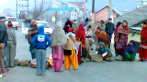 People protesting against PDD at Shiv Nagar Chowk in tehsil Bhaderwah.     -Excelsior/Tilak Raj