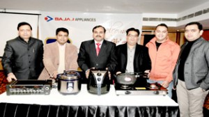 The officials of Bajaj Electricals launching new products in kitchen category at Jammu.-Excelsior/Rakesh