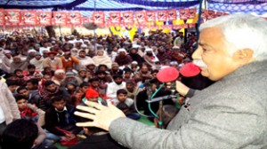 Senior NC leader and party candidate for Marh Assembly constituency, Ajay Sadhotra, addressing a huge gathering at Phallain area of the constituency.